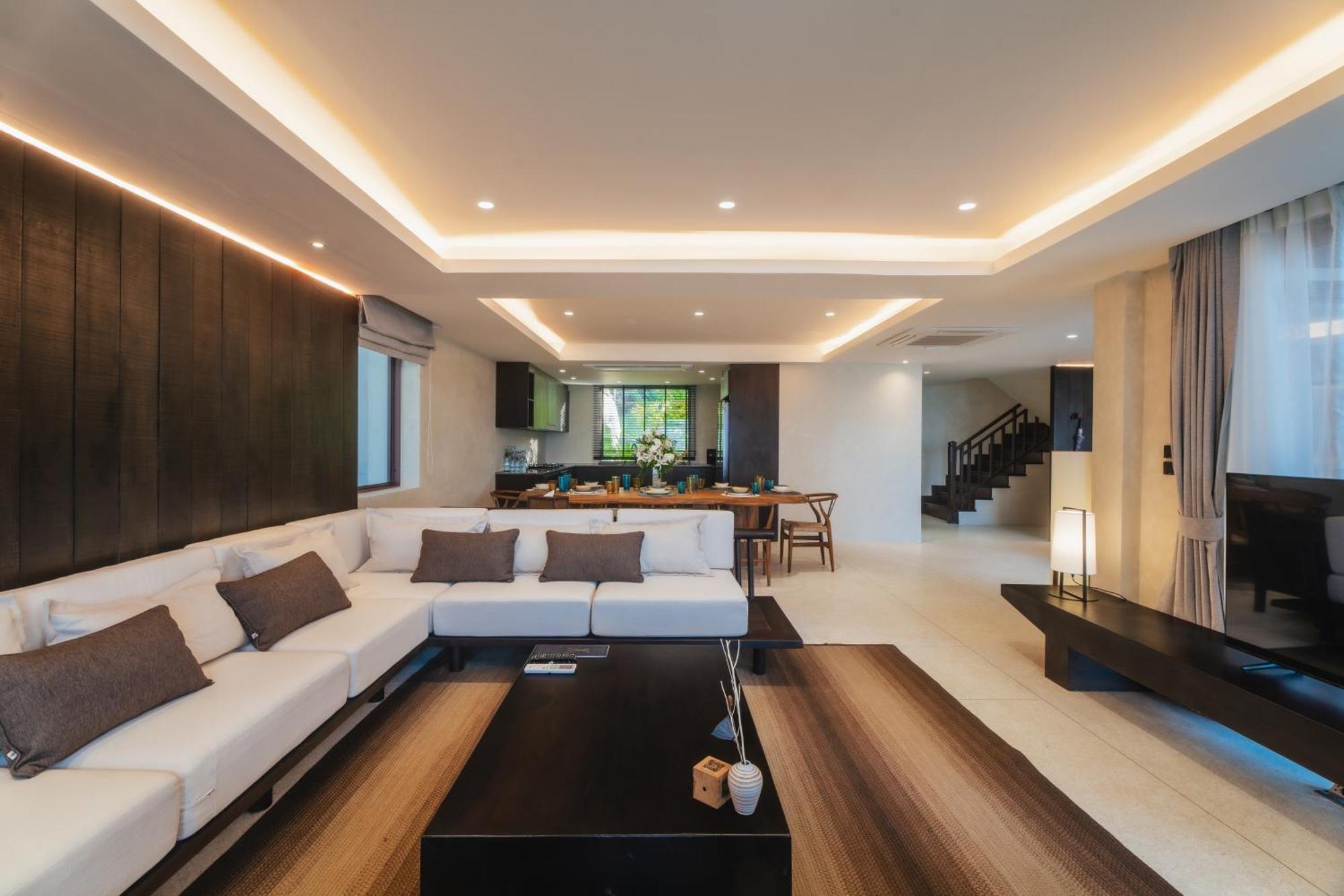 منتجع ذا فيلاج كوكونت آيلاند بيتش Phuket المظهر الخارجي الصورة A living room with indirect lighting